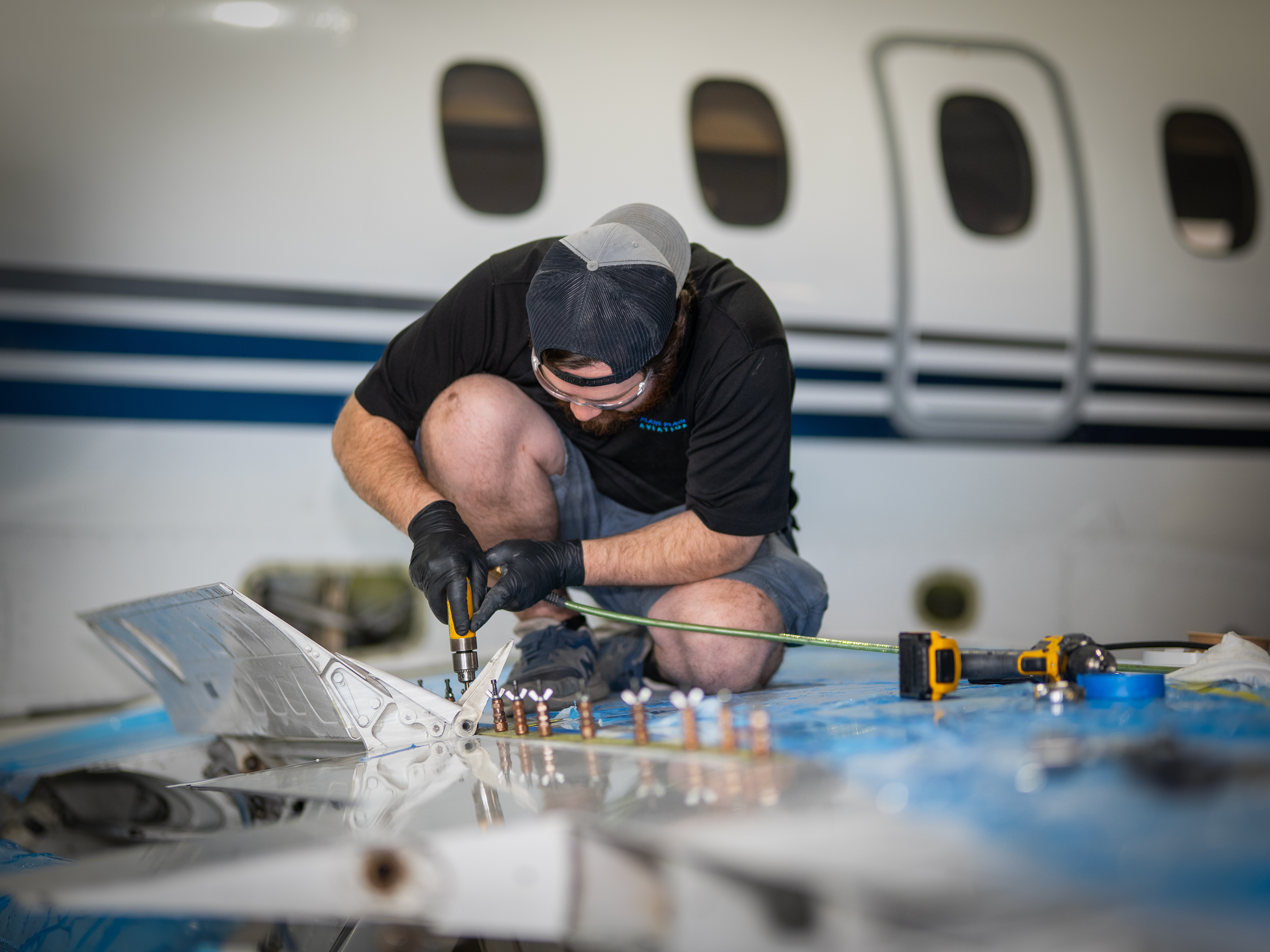 Plane Place Aviation technicians collaborating on winglet structural work